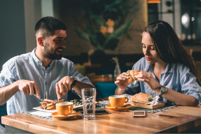 Couple eating at restaurant