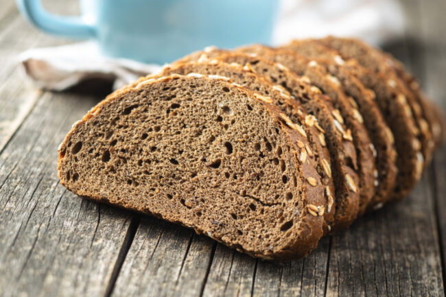 Sliced whole grain bread with oat flakes