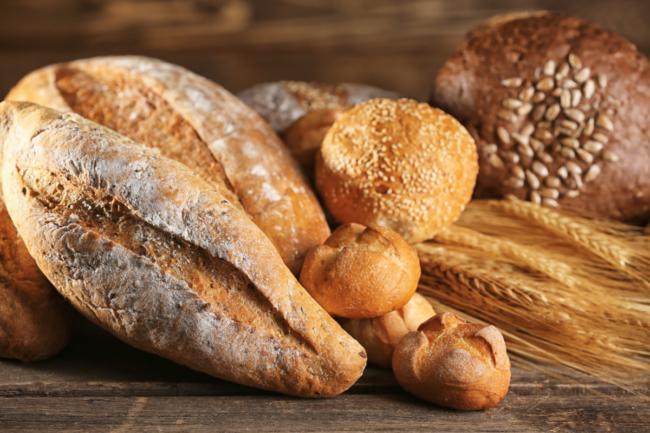 Variety of breads on a wooden table