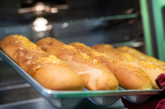 Subway bread on a baking pan