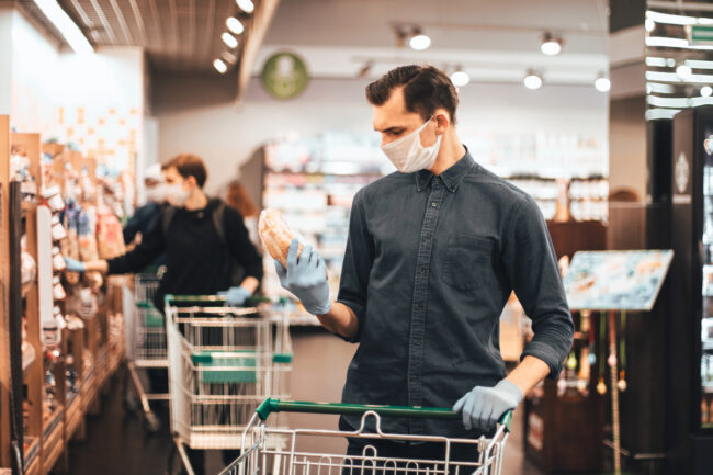 Man shopping for bread during pandemic