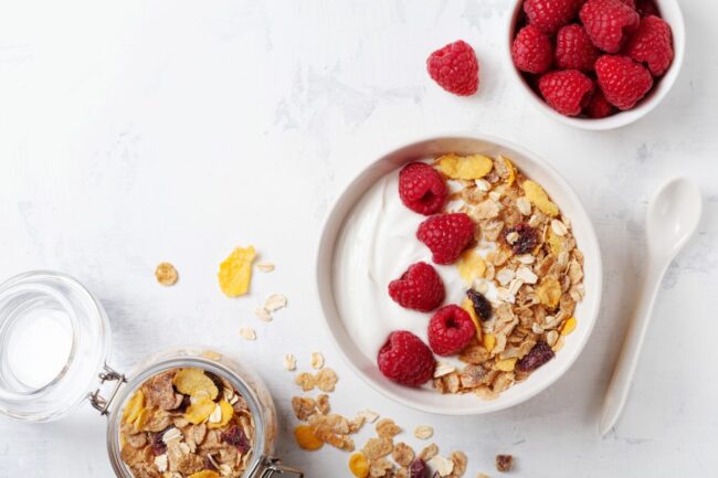 Yogurt with granola and raspberries