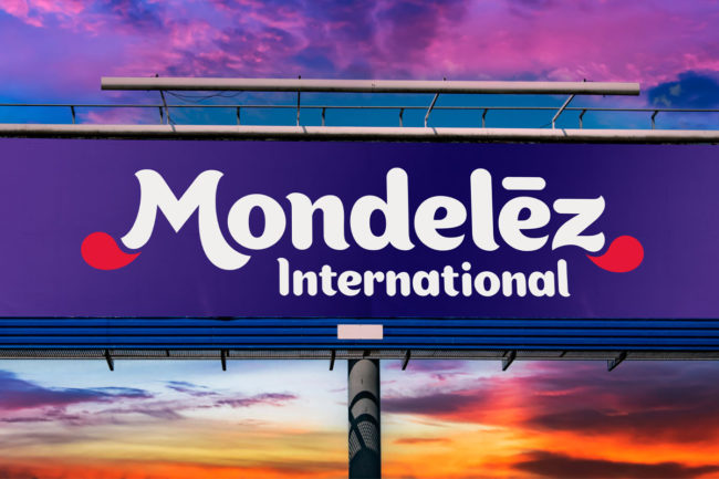 Mondelez International billboard, sunset sky.