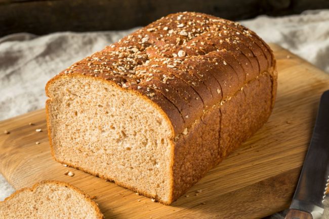 Whole wheat sliced bread loaf.