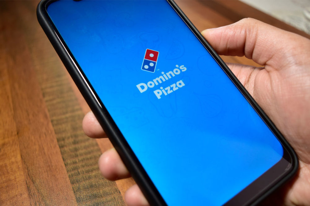 Domino's logo on phone. 