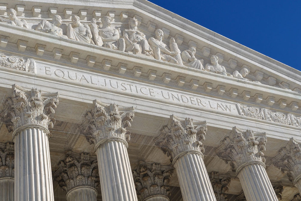 Outside of Supreme Court on sunny day. 