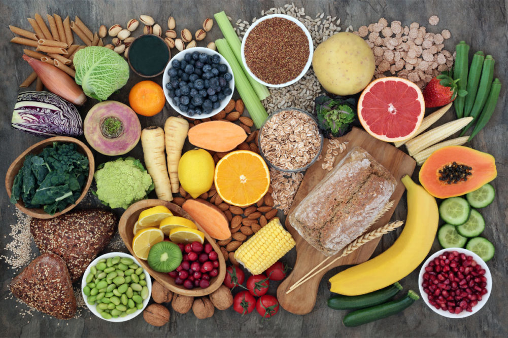 Assortment of fresh fruits, nuts & grains.