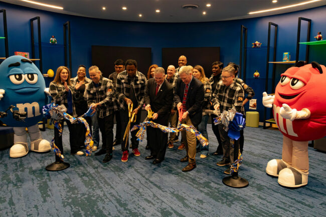 Mars employees cut ribbon on new R&D studio. 