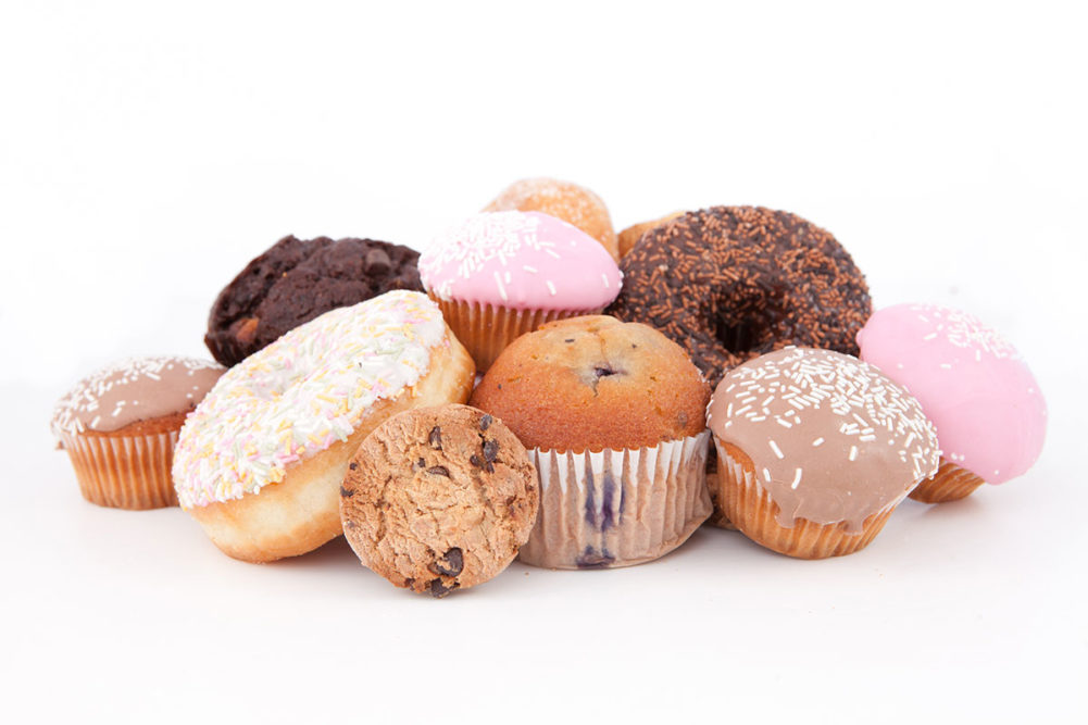 Assortment of cakes and cupcakes. 