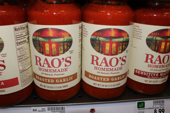Rao's pasta sauce on grocery store shelf. 