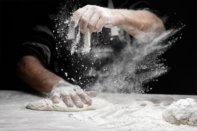 Baker using regenerative flour.