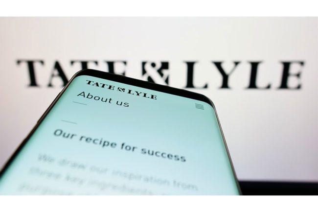 Tate & Lyle logo displayed on cellphone.
