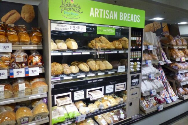 Assortment of artisan breads at grocery store. 