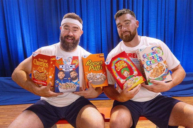 Jason and Travis Kelce pose with an assortment of General Mills cereals. 