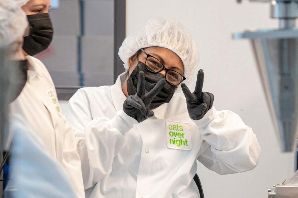 Overnight Oats employee poses for camera. 