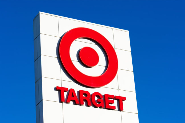 Target sign beneath blue sky. 