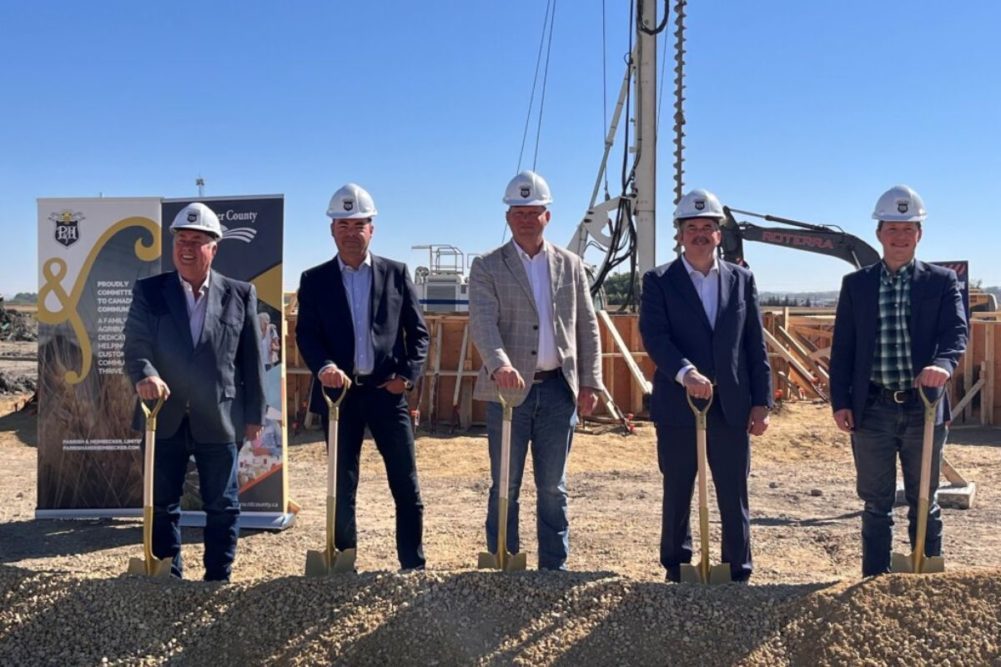 Employees at Parrish & Heimbecker break ground on new facility. 