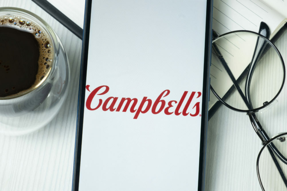 Campell's logo on cellphone. 