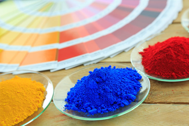 Orange, blue and red color powder. 