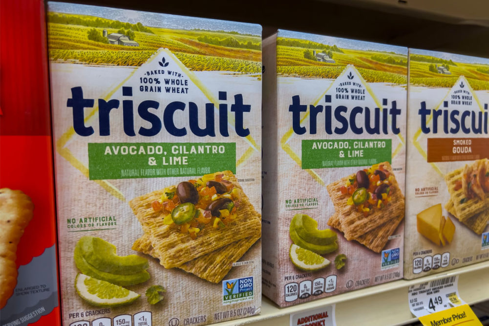 Boxes of Triscuits on grocery store shelf. 