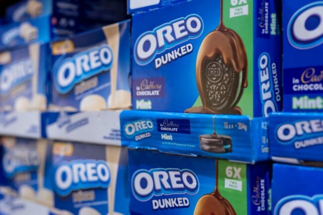 Oreo Dunked cookies on grocery store shelf. 