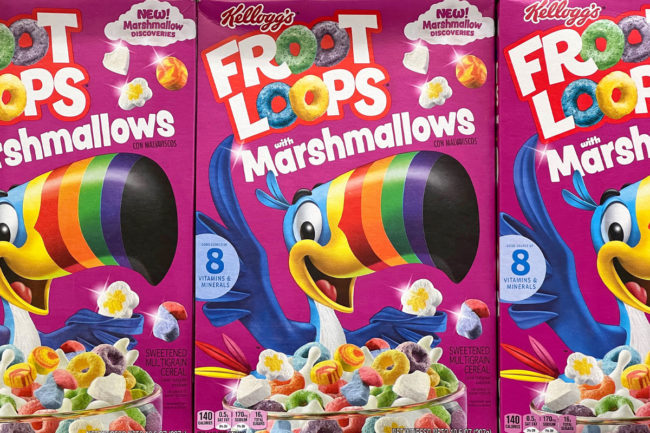 Boxes of Froot Loops on grocery store shelf. 