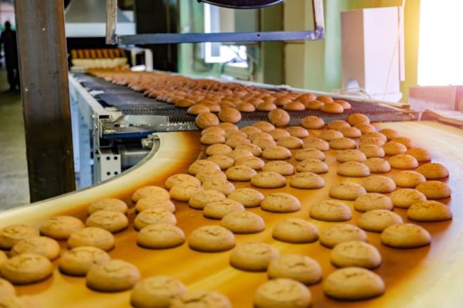 Cookies on an assembly line. 