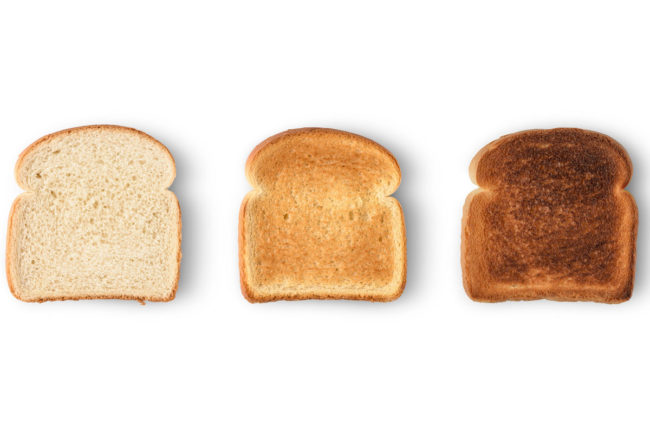 Three pieces of toasted bread. 