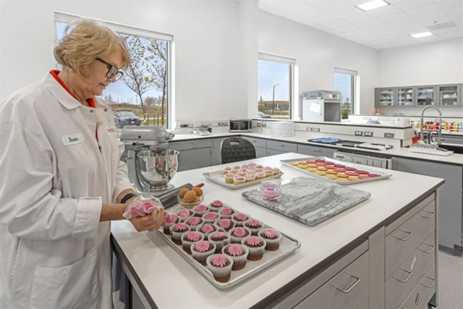 Woman works at the Oterra colors facility. 