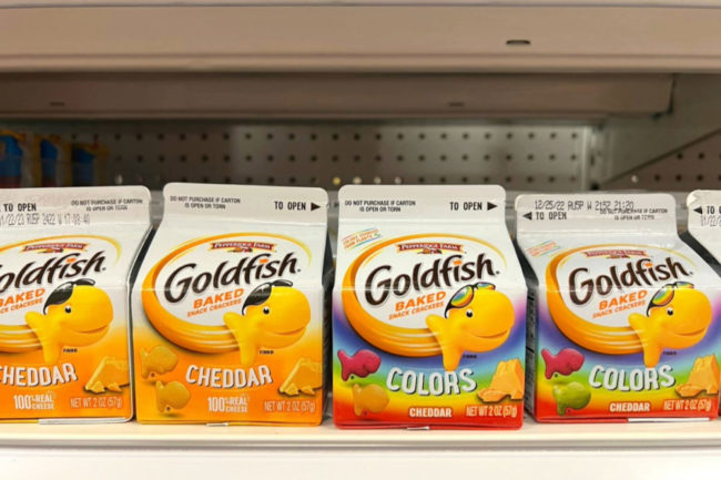 Packages of Goldfish on grocery store shelf. 