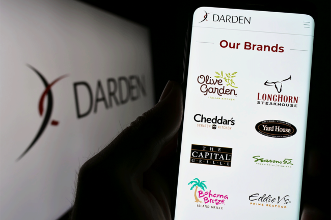 Darden restaurant logos listed out on phone. 