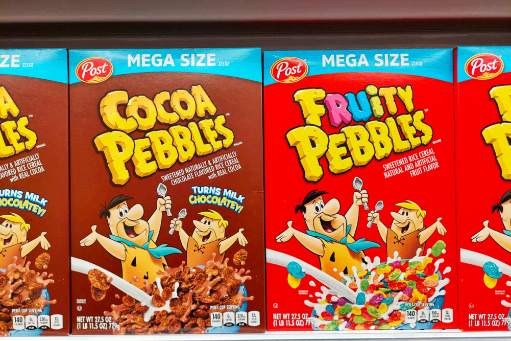 Cocoa Pebbles and Fruit Pebbles boxes. 