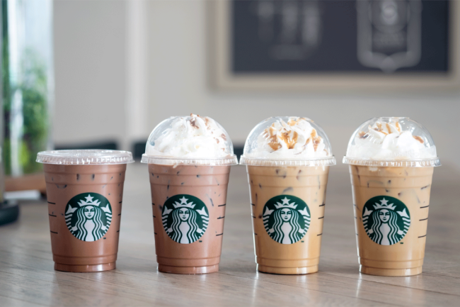 Lineup of Starbucks drinks.