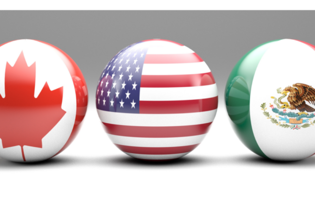 Three orb-shaped flags representing Canada, USA and Mexico. 