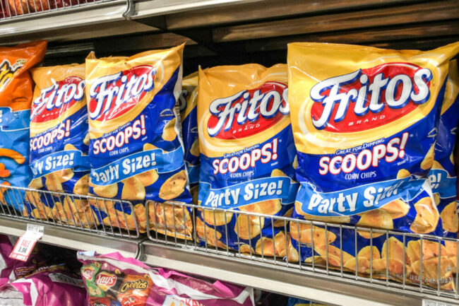 Bags of Fritos at grocery store. 